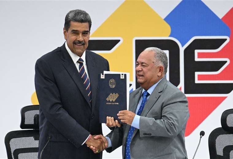 Nicolás Maduro, y el presidente del Consejo Nacional Electoral (CNE), Elvis Amoroso / AF