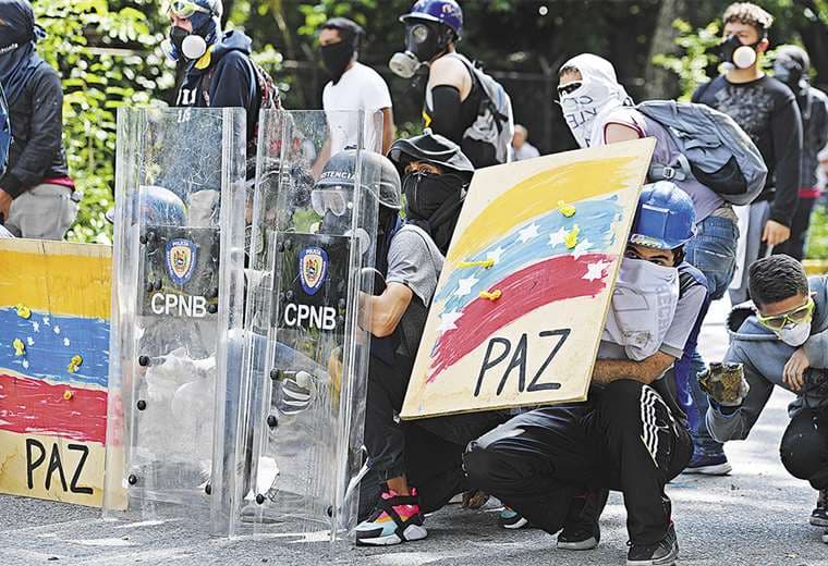 Opositores venezolanos se movilizarán hoy en las calles de Caracas para demandar la salida de Nicolás Maduro y el regreso de la democracia