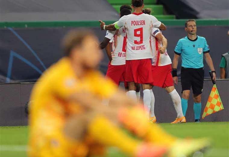 La celebración de los jugadores del Leipzig tras el gol de Adams. Foto: AFP