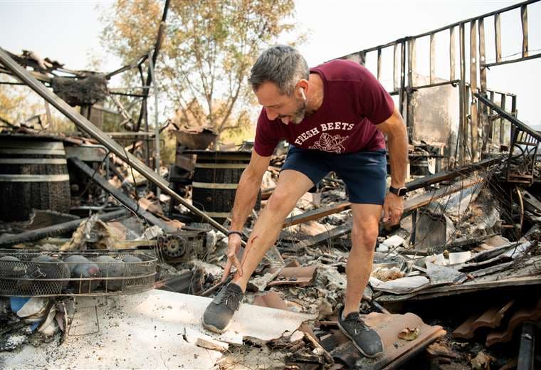 Una vivienda destruida por los incendios. Foto AFP