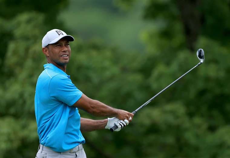 Tiger Woods volverá a jugar un torneo después de diez meses de su accidente. Foto: AFP