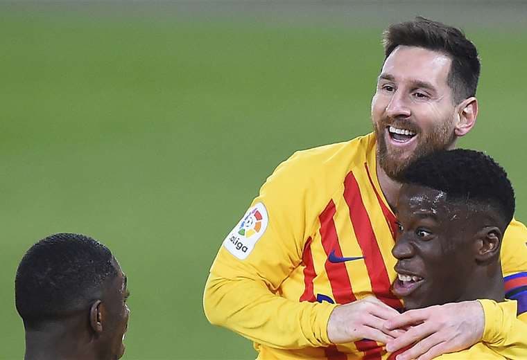 Moriba celebrando su gol con Messi. Foto: AFP 