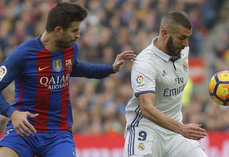 Piqué y Benzema, referentes del Barcelona y del Madrid, respectivamente. Foto: Internet