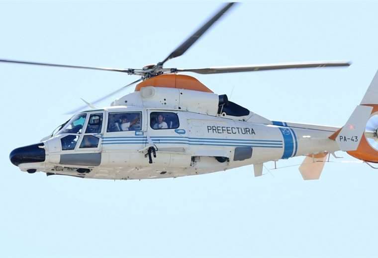 Dybala (izq.) y Molina (dcha.) se ven dentro del helicóptero. Foto: AFP