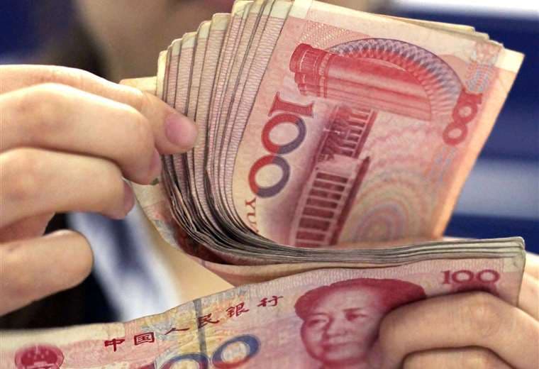 La moneda china, ya es usada por los bancos/Foto: AP